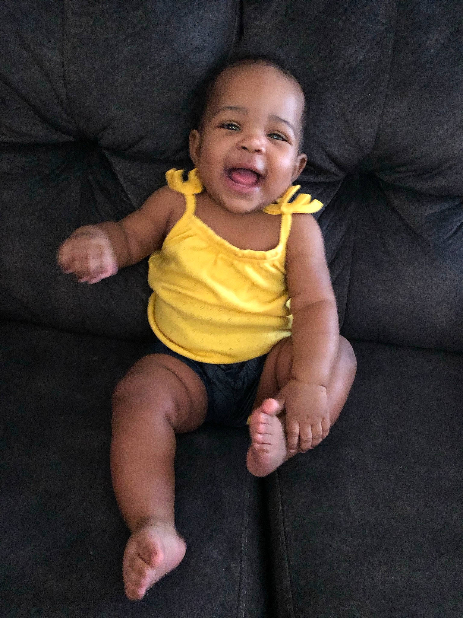 Rylee is registered to the contest to win money with this photo: baby, baby_toddler_clothing, barefoot, cheek, child, comfort, dress, flash_photography, foot, gesture, happy, human_leg, nose, person, skin, sleeve, smile, t_shirt, thumb, toddler