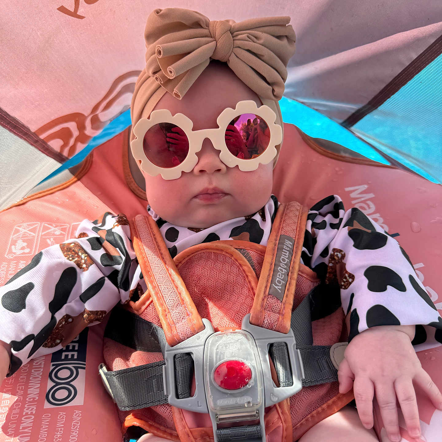 Amelia joined the competition — help win amazing prizes! accessory, baby, bow, car_seat, child, clothing, cow_print, cute, fashion, headband, infant, outdoor, person, pink, portrait, reflection, seatbelt, shade, strap, sunglasses