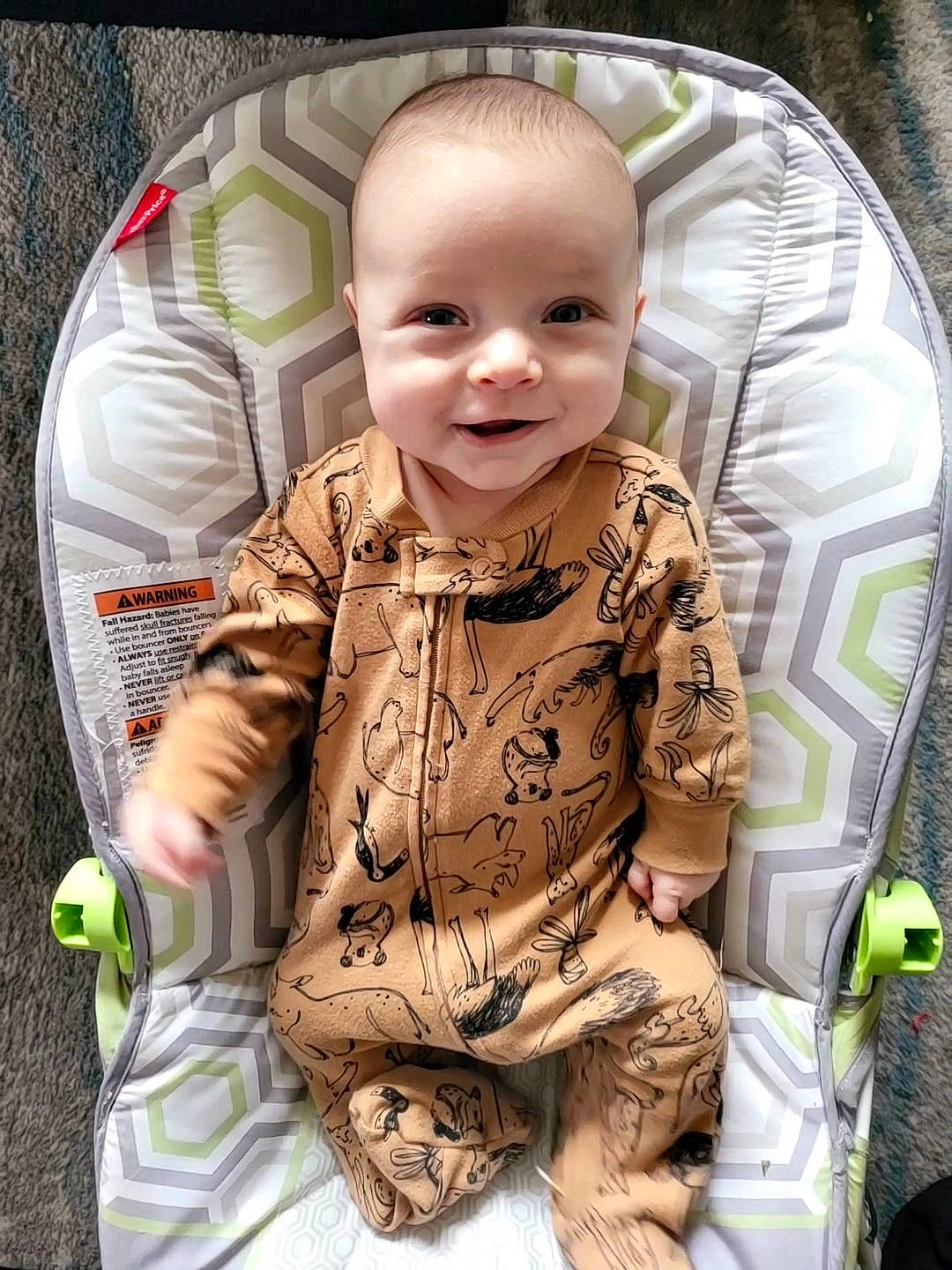 Walker joined the competition — help win amazing prizes! baby, baby_carriage, baby_products, baby_safety, baby_toddler_clothing, car_seat, cheek, child, comfort, facial_expression, fun, happy, joy, outerwear, pattern, person, seat_belt, sitting, skin, sleeve