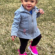 Avah is registered to the contest to win money with this photo: child, curly_hair, cute, fashion, feet, grass, happy, headband, jacket, nature, outdoor, person, pink_shoes, playful, portrait, smile, sneakers, toddler, walking, young_child