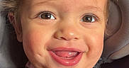 Avah is registered to the contest to win money with this photo: baby, car_seat, child, cute, eyes, face, hair, happy, indoors, infant, mouth, pink_shirt, portrait, safety, seatbelt, smiling, straps, toddler, tongue, young_child