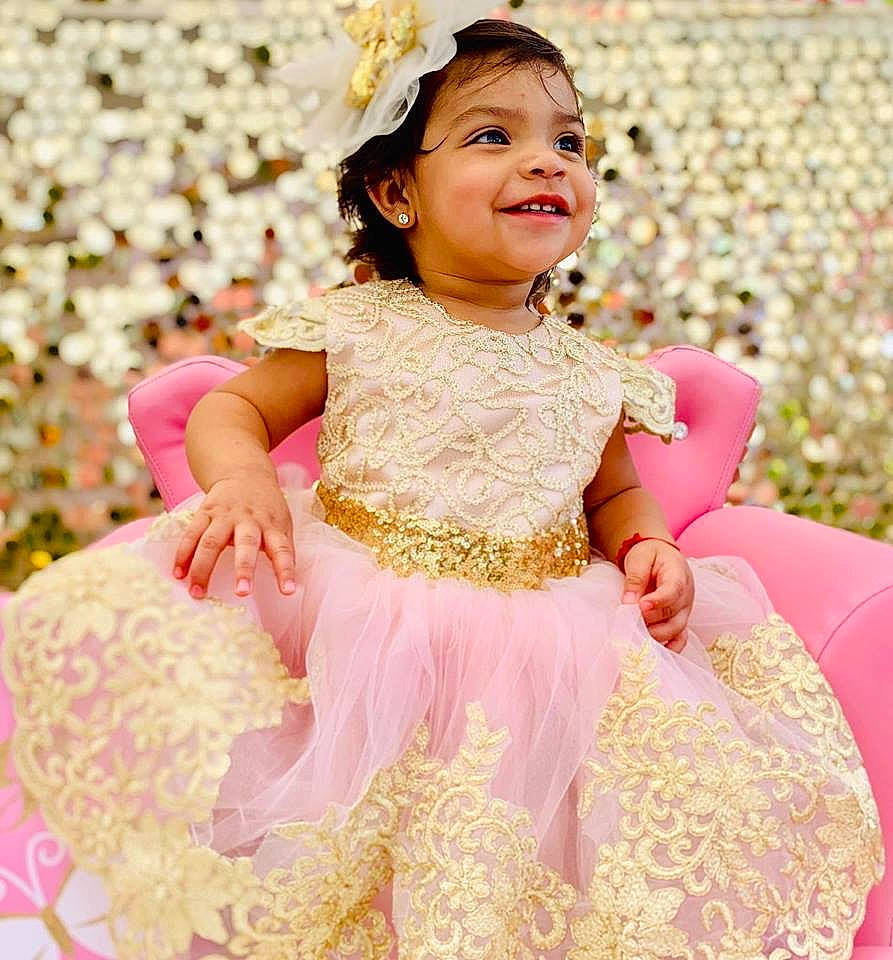 Mia Annalee  joined the competition — help win amazing prizes! baby, child, child_model, clothing, costume, dress, embellishment, fashion_accessory, formal_wear, gown, hair_accessory, peach, person, petal, pink, product, ruffle, sleeve, toddler, wedding_ceremony_supply