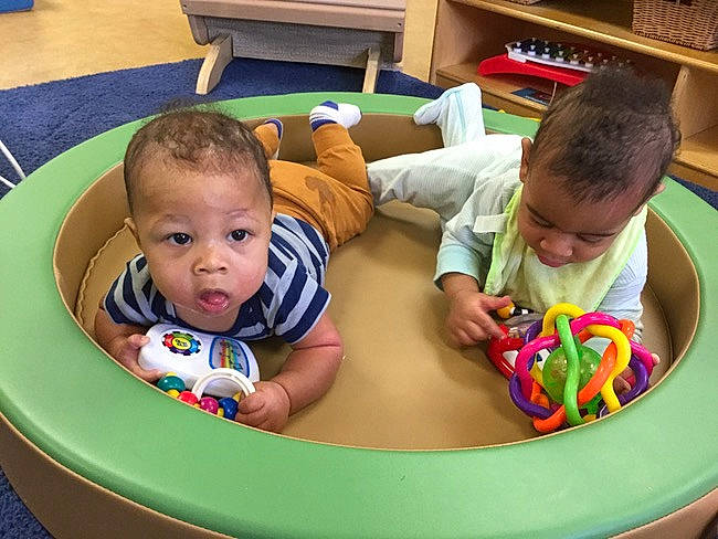 Isaac is registered to the contest to win money with this photo: baby, baby_playing_with_toys, baby_products, baby_toddler_clothing, baby_toys, child, fun, games, green, head, leisure, mammal, person, play, playing_with_kids, product, recreation, sharing, sitting, toddler