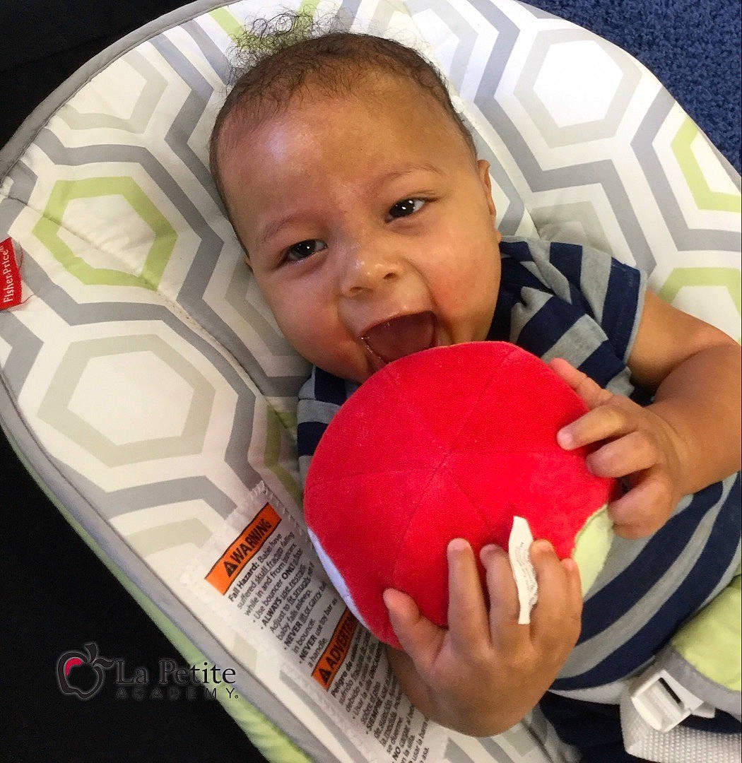 Isaac joined the competition — help win amazing prizes! baby, baby_toddler_clothing, ball, beauty, child, eyelash, facial_expression, finger, football, fun, gesture, happy, mouth, nail, nose, organ, person, product, skin, smile