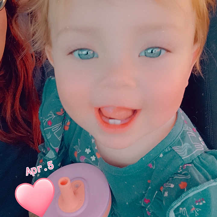 Rylie joined the competition — help win amazing prizes! baby, bodypart, car, clothing, dress, face, finger, food, formalwear, hand, head, machine, mouth, person, photography, portrait, sweets, transportation, vehicle, wheel