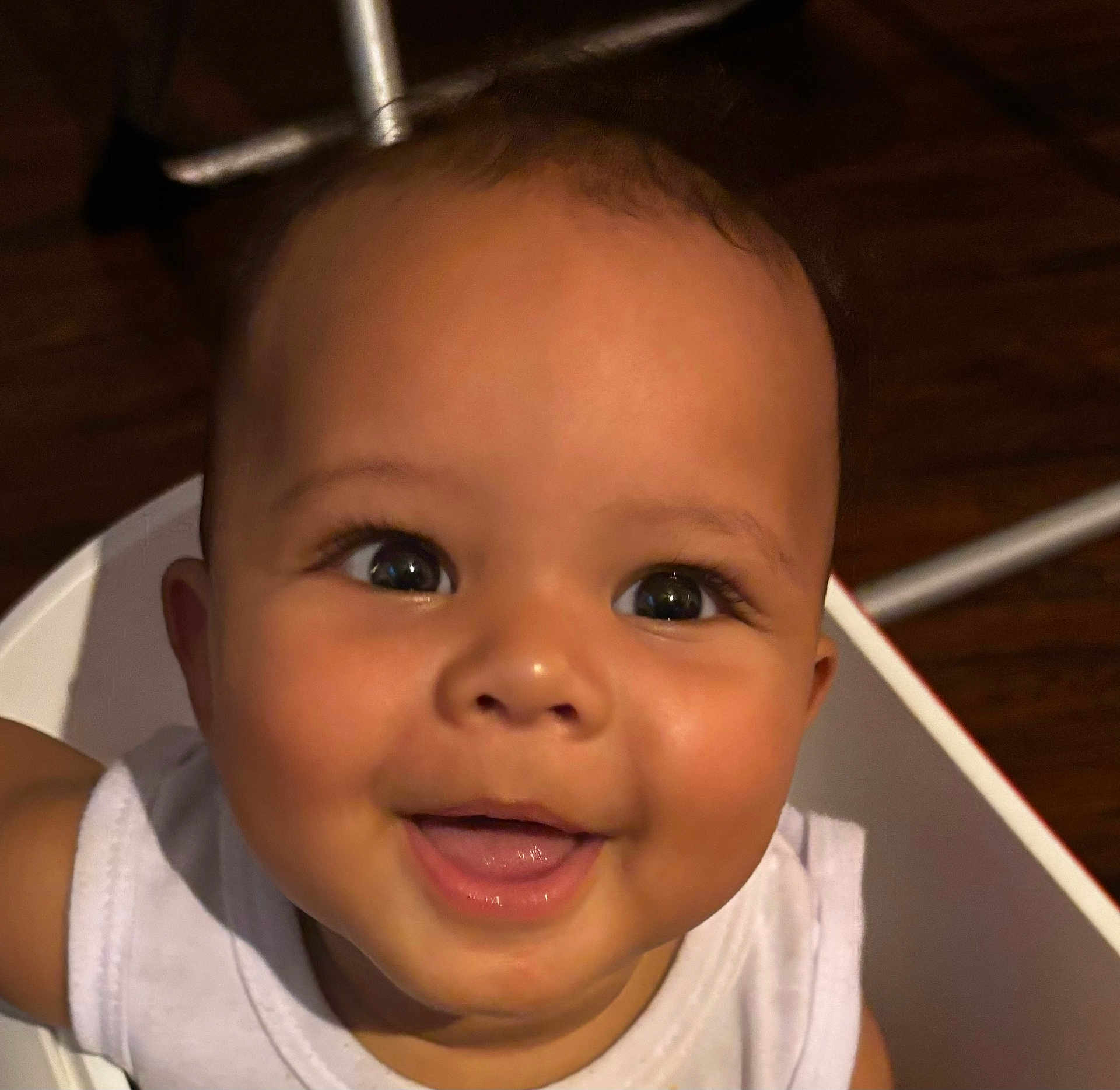 Justin joined the competition — help win amazing prizes! baby, smiling, face, child, infant, happy, person, white_clothing, sitting, chair, indoors, closeup, cute, young_child, portrait, expression, skin, head, eyes, mouth