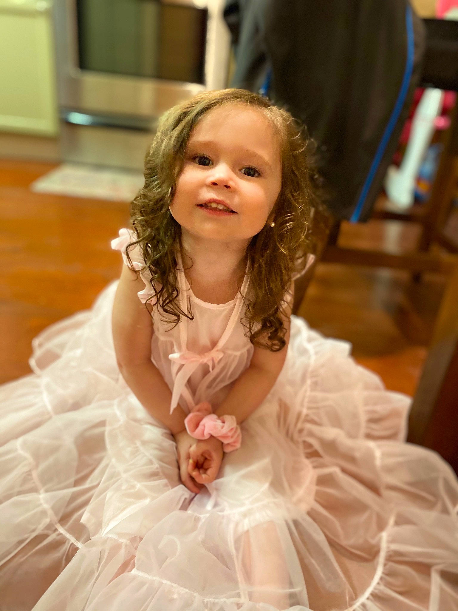 Jaylee is registered to the contest to win money with this photo: bridal_accessory, bridal_clothing, bridal_party_dress, chair, dress, embellishment, event, fashion_design, flooring, formal_wear, fun, gown, happy, headpiece, iris, person, skin, smile, toddler, wedding_ceremony_supply