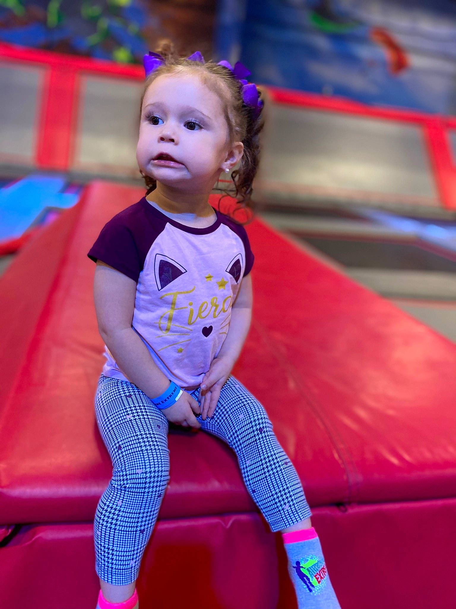 Jaylee is registered to the contest to win money with this photo: baby_toddler_clothing, child, electric_blue, entertainment, event, face, flooring, fun, hairstyle, happy, leisure, magenta, performing_arts, person, pink, purple, recreation, skin, smile, thigh