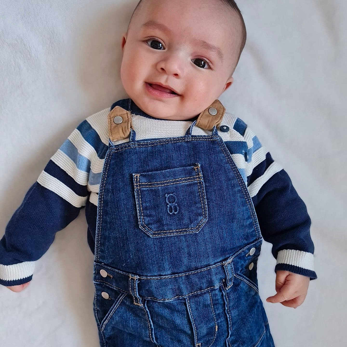 Tuan participe au concours pour gagner de l'argent avec cette photo : baby, clothing, coat, face, happy, head, jacket, jeans, longsleeve, pants, person, photography, portrait, sleeve, smile, standing, vest