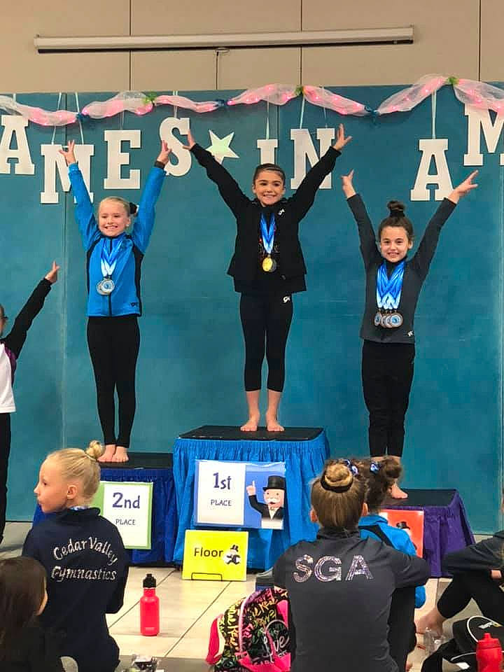 Paityn is registered to the contest to win money with this photo: championship, competition, competition_event, electronic_device, event, joy, performance, person, podium, sports, stage_equipment, talent_show, team, technology