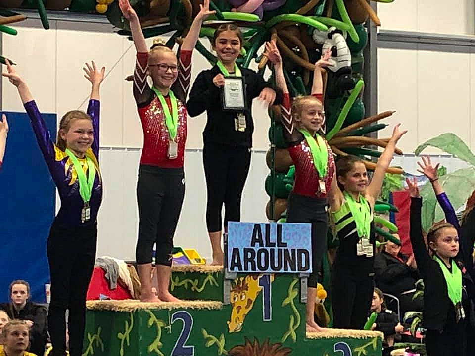Paityn is registered to the contest to win money with this photo: championship, cheering, community, competition, competition_event, electronic_device, event, joy, leisure, performance, person, podium, stage_equipment, team, technology