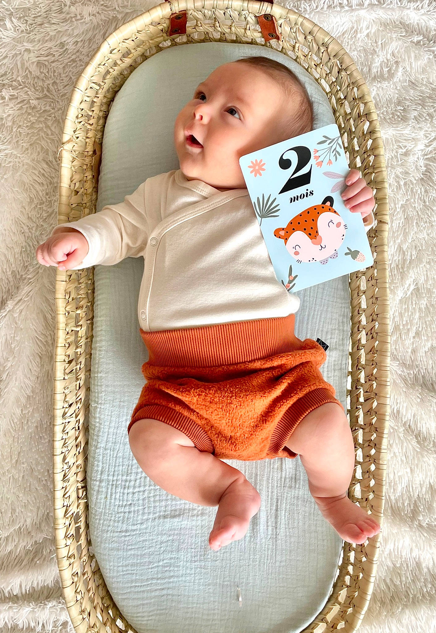 Noah participe au concours pour gagner de l'argent avec cette photo : abdomen, baby, baby_products, baby_sleeping, baby_toddler_clothing, chair, cheek, child, comfort, fashion_accessory, linens, pattern, person, sitting, skin, sleeve, sock, t_shirt, textile, thigh