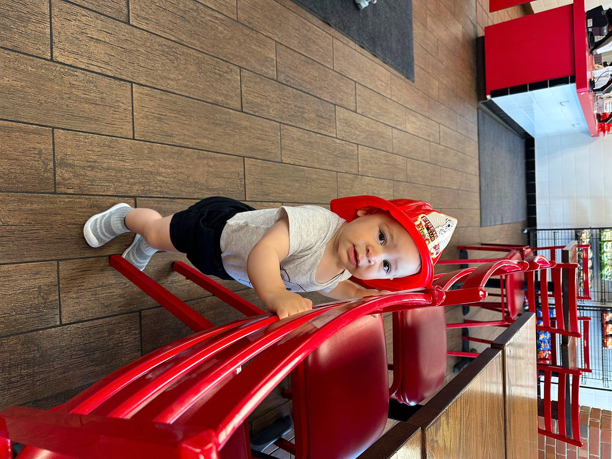 Leo joined the competition — help win amazing prizes! auto_part, automotive_design, automotive_exterior, automotive_tire, automotive_wheel_system, bumper, carmine, child, fun, hat, headwear, human_leg, leisure, motor_vehicle, person, recreation, sitting, t_shirt, television, tire