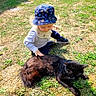 Symba a rejoint le concours — aidez-le/la à gagner de superbes lots ! baby, backyard, baseballcap, cap, clothing, face, field, grass, grassland, hat, head, nature, outdoors, park, person, photography, plant, portrait, soil, yard