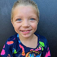 Bryce joined the competition — help win amazing prizes! child, smile, blue_eyes, short_hair, tshirt, dinosaur, colorful_clothing, face, portrait, casual, happy, young, scrape, freckles, outdoor, metal_background, closeup, person, head_and_shoulders, playful