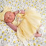 newborn, baby, sleeping, yellow, dress, headband, bow, blanket, floral, pattern, cute, infant, soft, cozy, peaceful, small, child, sock, lying, resting