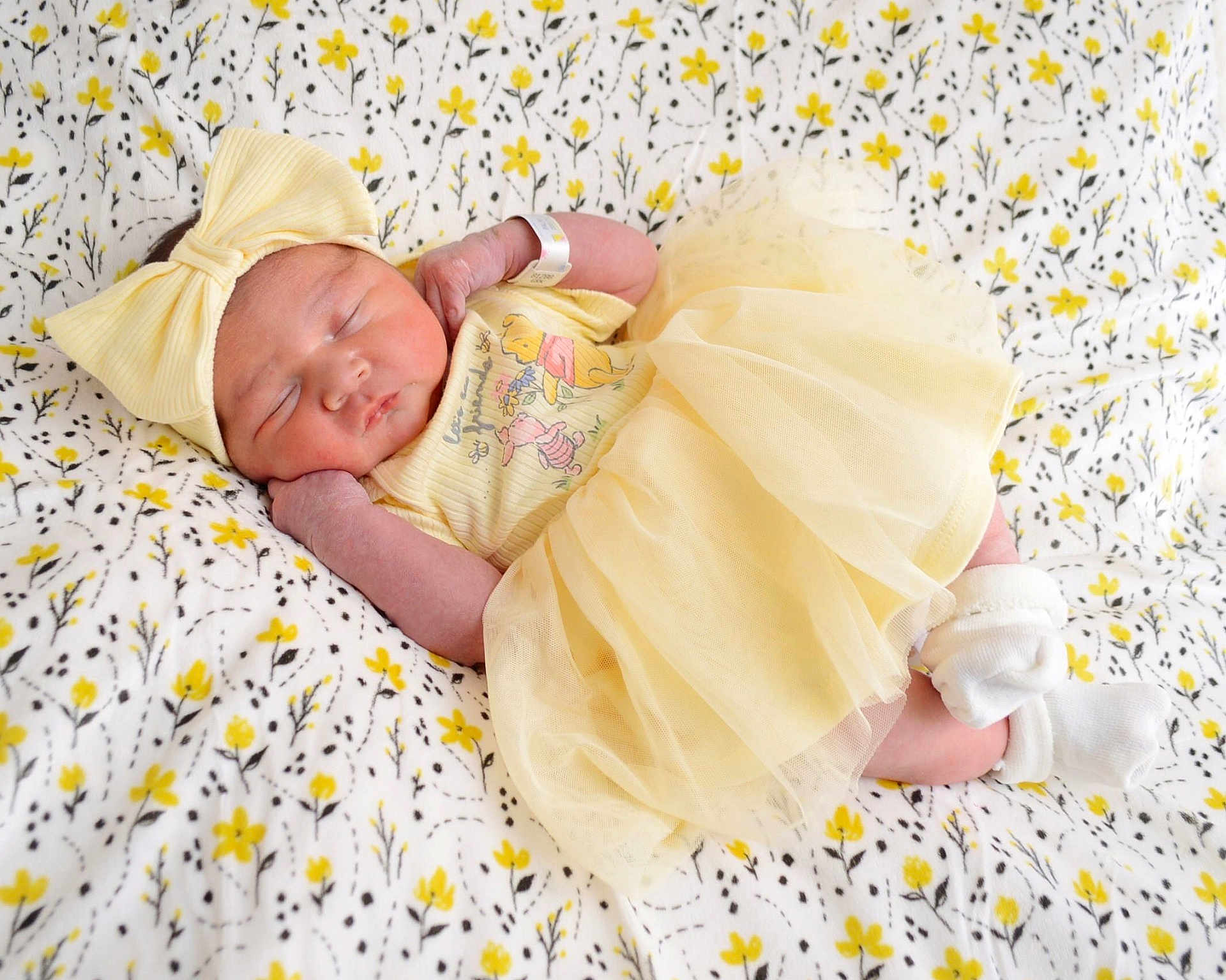 Carla joined the competition — help win amazing prizes! newborn, baby, sleeping, yellow, dress, headband, bow, blanket, floral, pattern, cute, infant, soft, cozy, peaceful, small, child, sock, lying, resting
