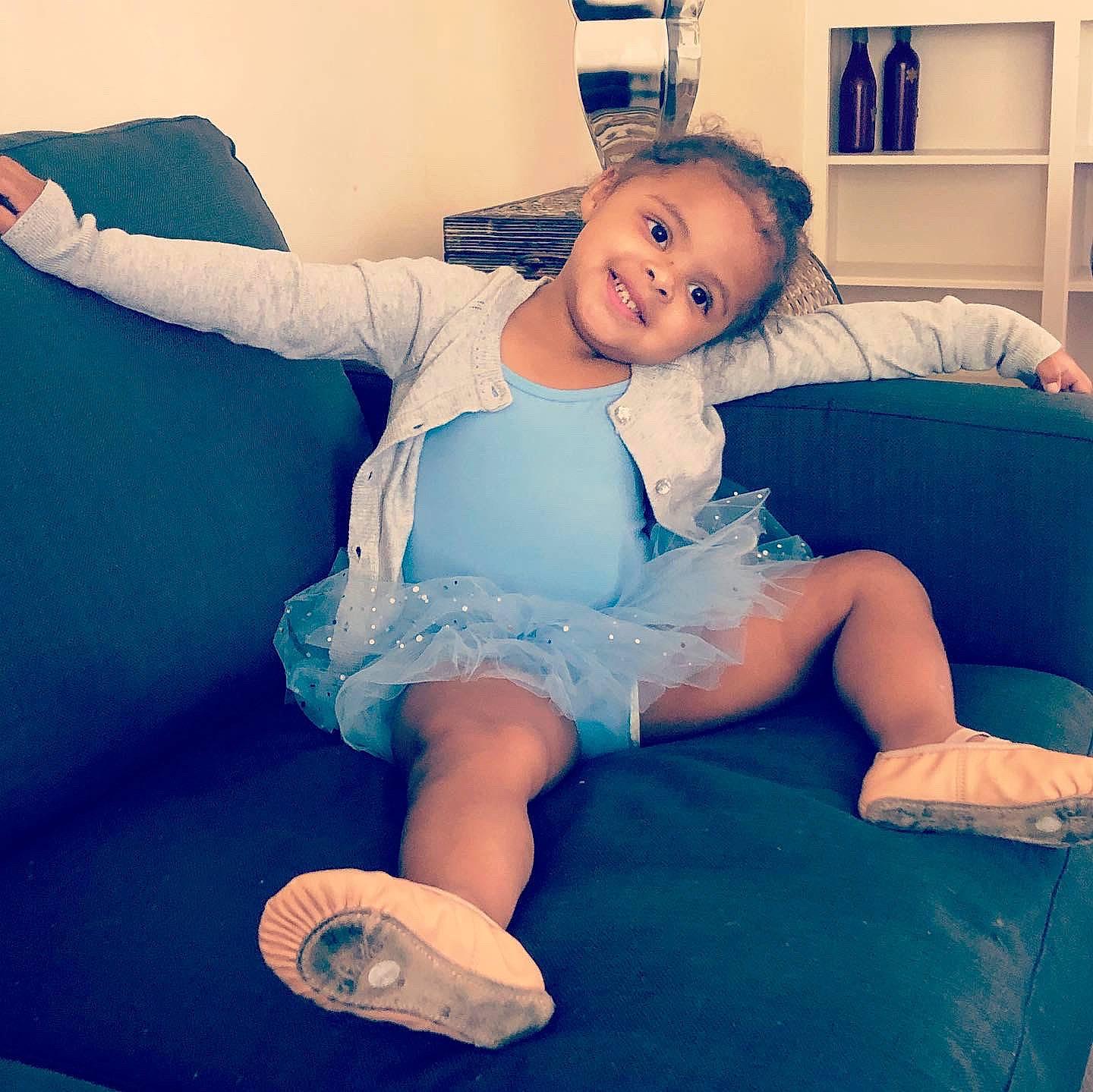 Elara joined the competition — help win amazing prizes! azure, baby, baby_toddler_clothing, comfort, couch, face, finger, flash_photography, happy, human_body, joy, knee, leg, light, person, shoe, shorts, sleeve, sportswear, t_shirt