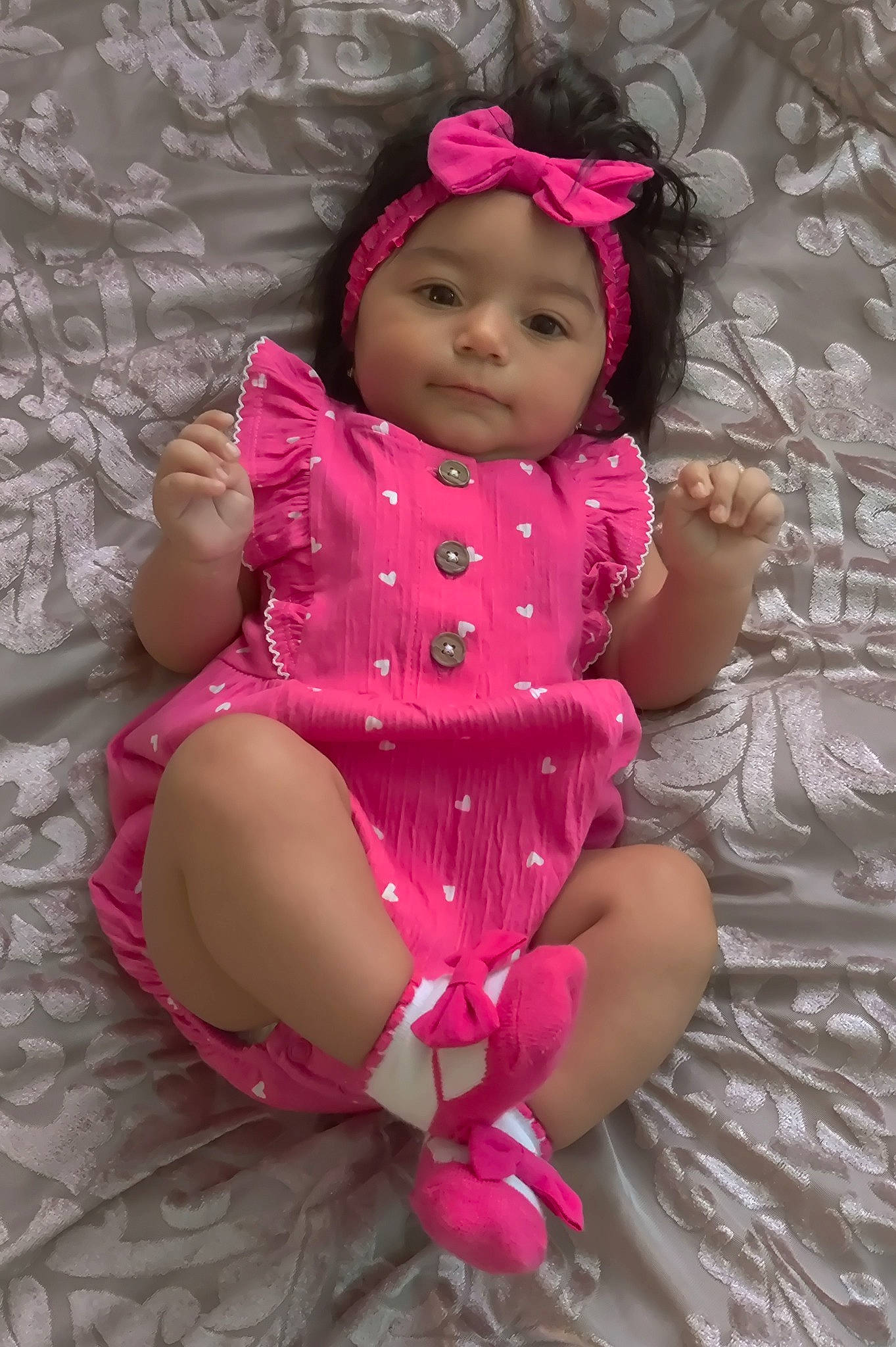 Marielys joined the competition — help win amazing prizes! arm, baby_toddler_clothing, cheek, dress, eye, face, finger, hand, happy, head, headgear, headwear, human_body, lip, one_piece_garment, person, pink, purple, skin, sleeve