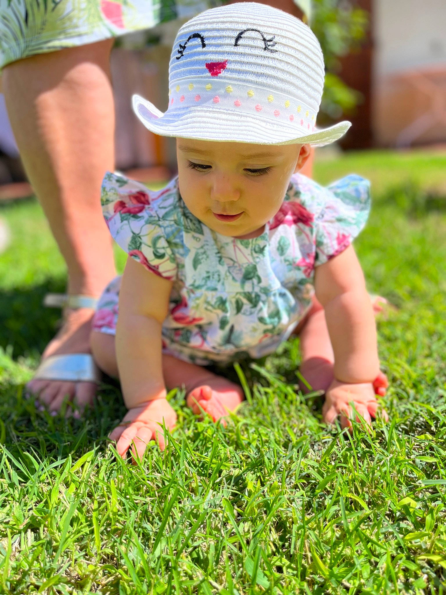 Isabella participe au concours pour gagner de l'argent avec cette photo : baby, baby_toddler_clothing, cap, clothing, fun, grass, grass_family, green, groundcover, happy, hat, headwear, lawn, leisure, people_in_nature, person, pink, plant, shorts, summer