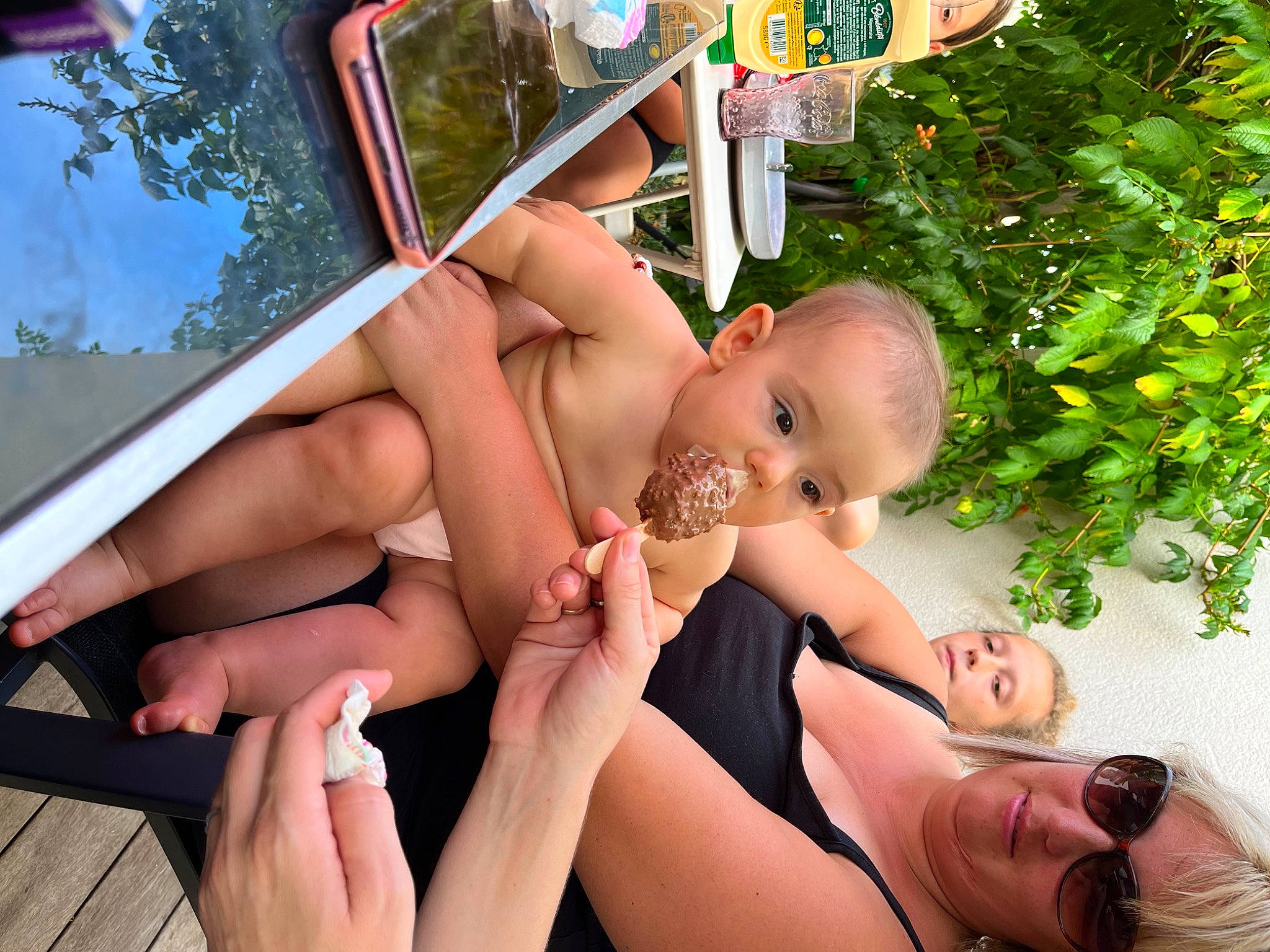 Isabella participe au concours pour gagner de l'argent avec cette photo : barefoot, black_hair, finger, foot, fun, grass, hand, happy, leg, leisure, muscle, people_in_nature, person, plant, skin, summer, swimwear, thigh, thumb, tree