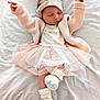 baby, sleeping, tutu, pink, headband, knitted_sweater, white_blanket, infant, cute, peaceful, lying_down, cozy, soft, newborn, small_feet, child, adorable, fashion, portrait, resting