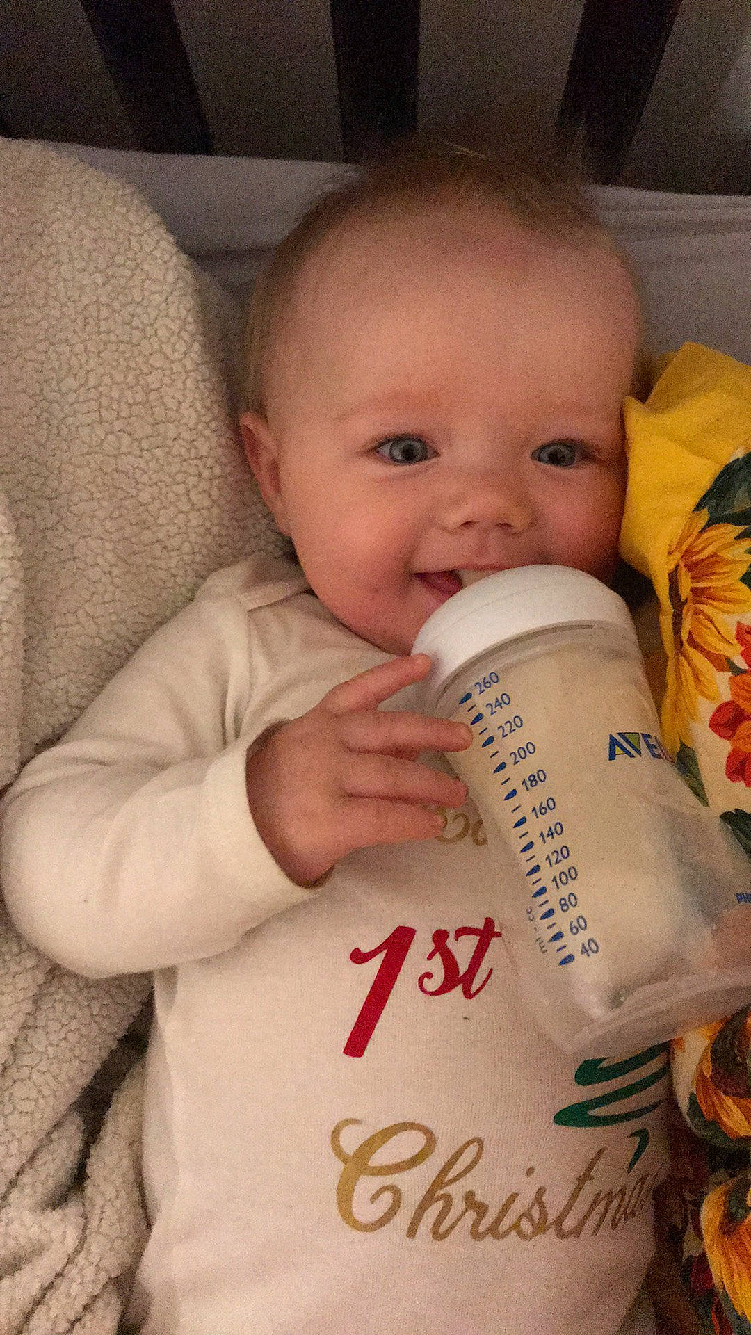 Macy is registered to the contest to win money with this photo: baby, baby_bottle, baby_products, baby_toddler_clothing, car_seat, cheek, child, dairy, drink, drinkware, finger, head_restraint, infant_formula, joy, milk, person, plastic, plastic_bottle, product, skin