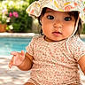 Kendall joined the competition — help win amazing prizes! baby, child, infant, hat, floral, sitting, outdoor, pool, cute, portrait, sunhat, summer, childhood, one_person, young_child, skin, clothing, face, expression, daylight