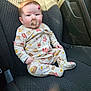 Lilly joined the competition — help win amazing prizes! baby, pacifier, car_seat, pajamas, infant, birthmark, sunlight, seat, clothing, child, cute, indoor, portrait, young_child, person, car_interior, seatbelt, car, head, face