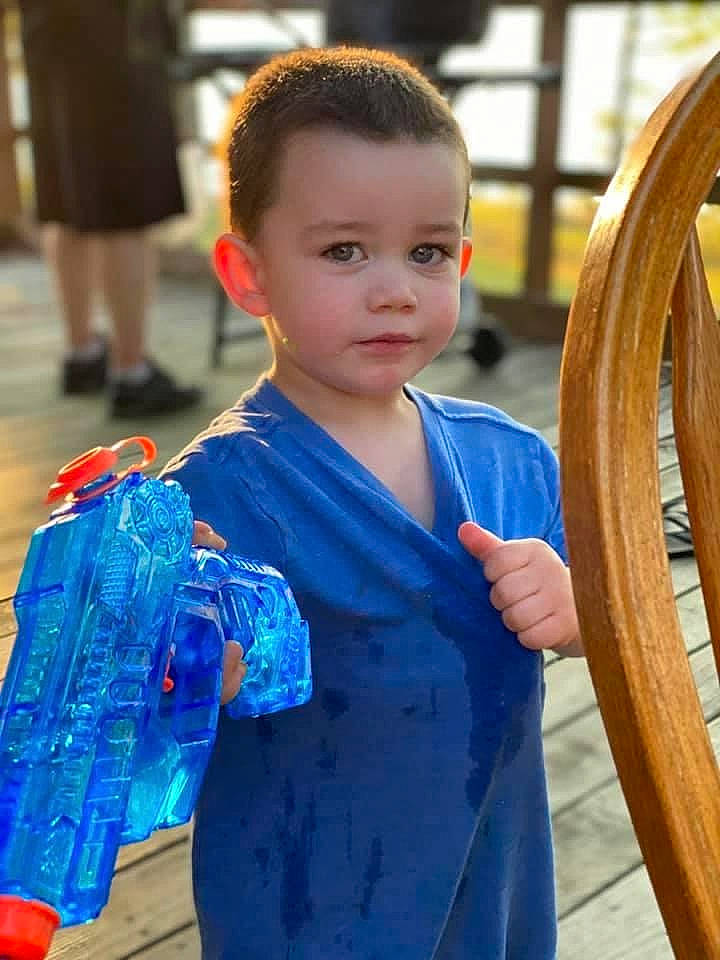 Joshua is registered to the contest to win money with this photo: blue, child, costume, electric_blue, person, smile, standing, toddler