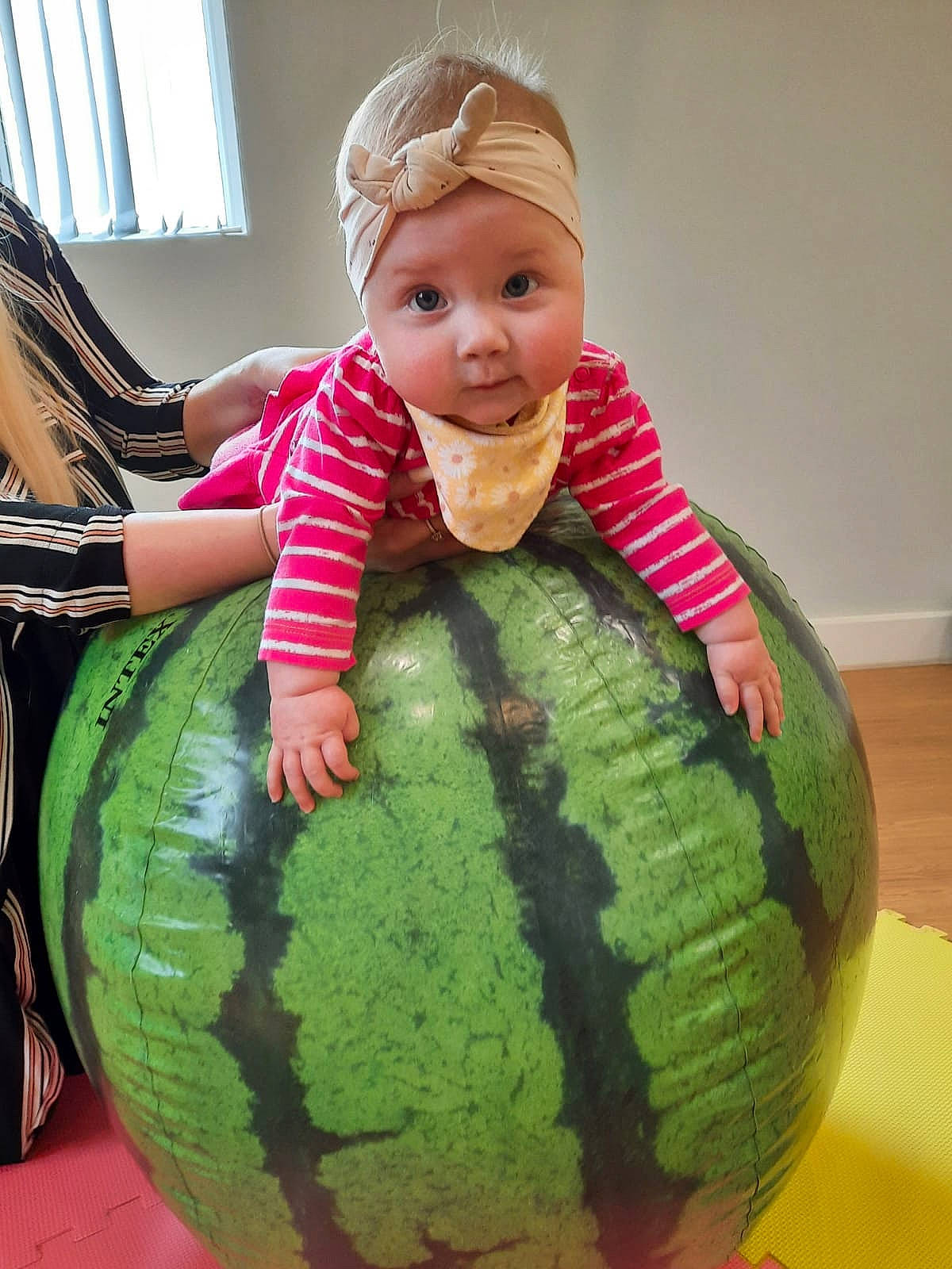 Lottie joined the competition — help win amazing prizes! arm, baby, baby_toddler_clothing, ball, cheek, eye, face, finger, fruit, hand, happy, head, headwear, human_body, mammal, natural_foods, organ, person, plant, product