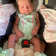 Reeson joined the competition — help win amazing prizes! baby, infant, sleeping, car_seat, headband, flower, clothing, blanket, sock, child, seatbelt, cute, newborn, resting, indoors, soft_toys, baby_girl, patterned_fabric, comfort, peaceful
