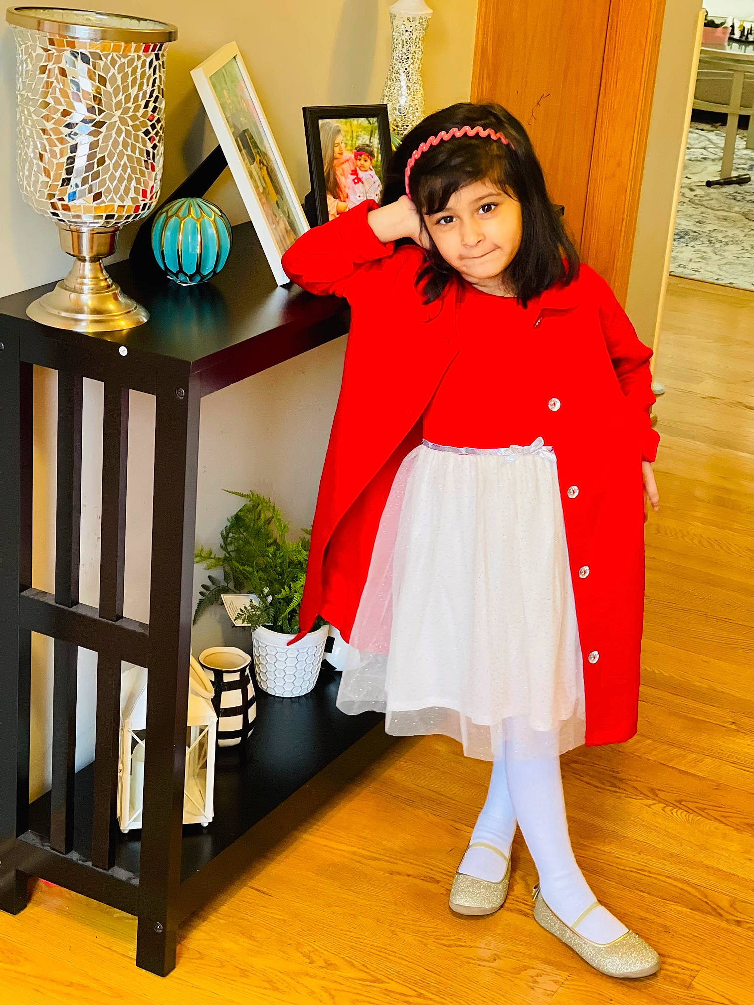 Eshaal joined the competition — help win amazing prizes! event, fashion_accessory, fashion_design, flooring, formal_wear, happy, hat, high_heels, human_leg, joy, knee, pattern, peach, person, room, shelf, sleeve, smile, thigh, toddler