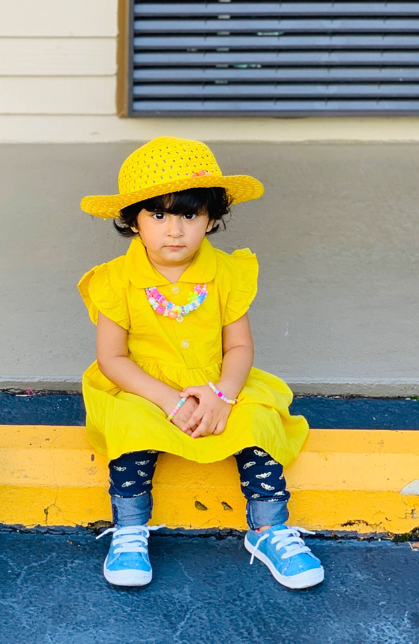 Eshaal joined the competition — help win amazing prizes! asphalt, baby_toddler_clothing, cap, cool, electric_blue, face, footwear, fun, happy, hat, headgear, headwear, knee, person, sleeve, sneakers, sun_hat, tints_and_shades, toddler, window