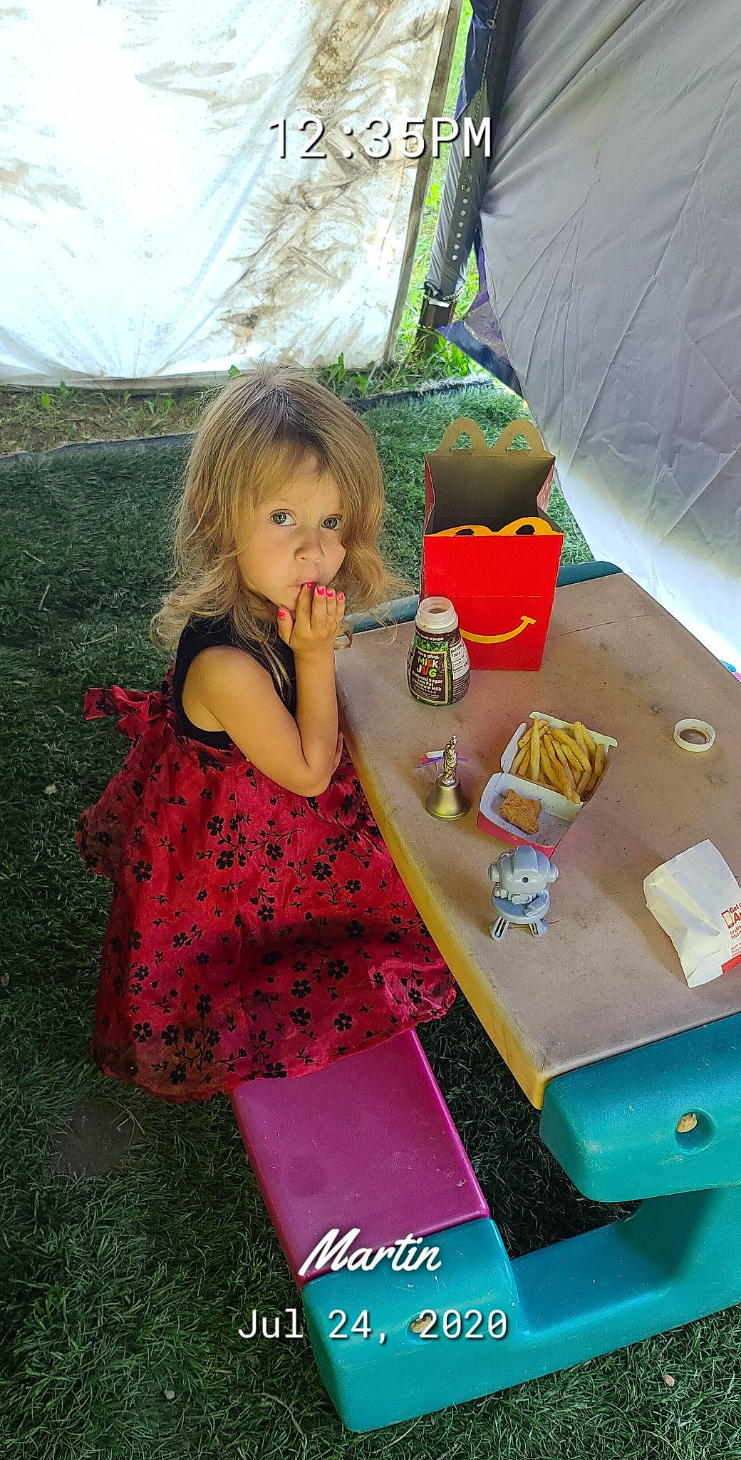 Carlee is registered to the contest to win money with this photo: baby_toddler_clothing, box, child, food, fun, grass, happy, leisure, magenta, party, person, play, recreation, room, sharing, sitting, sweetness, table, tableware, toddler