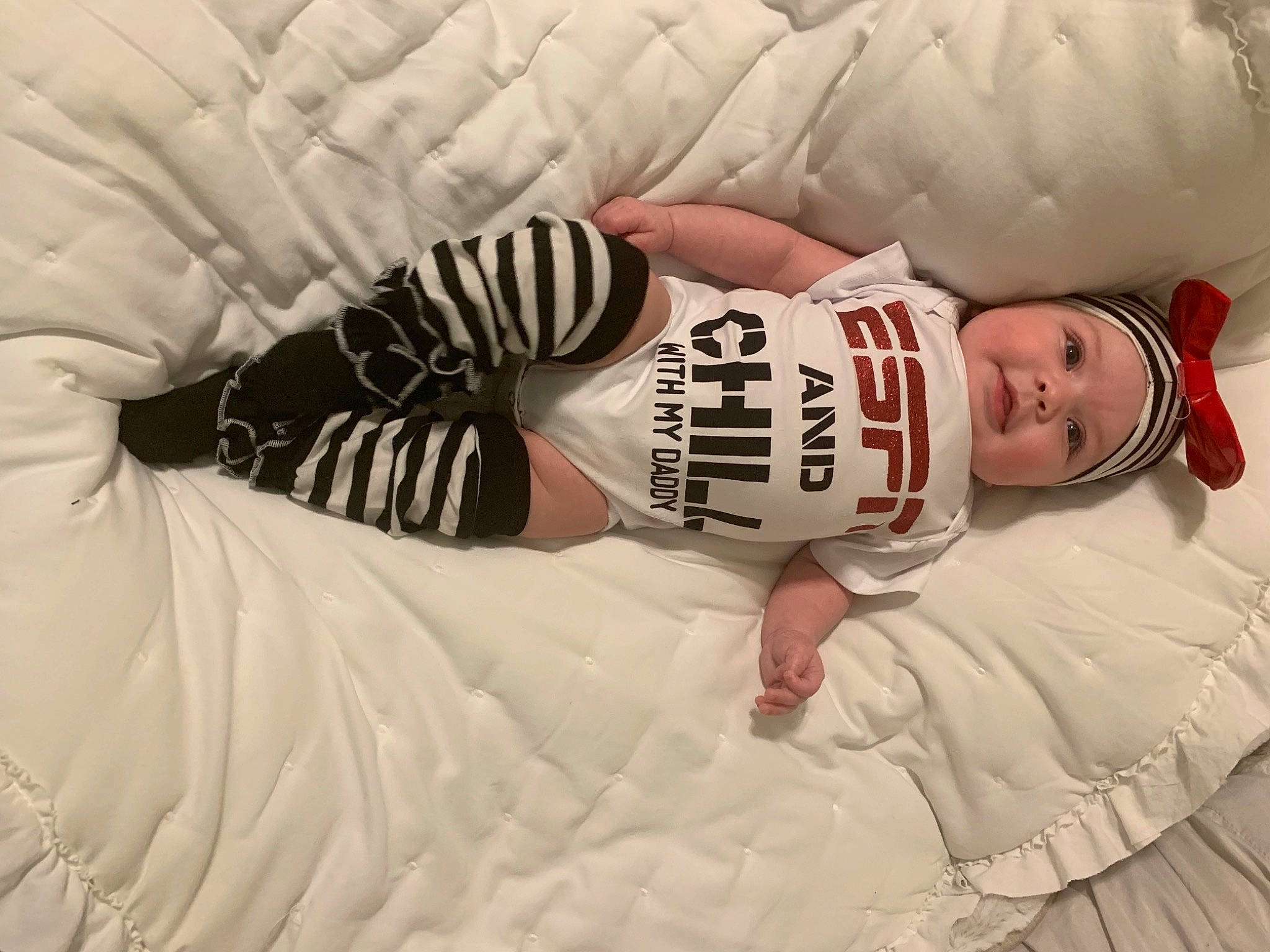 Aurielle is registered to the contest to win money with this photo: abdomen, baby, baby_toddler_clothing, comfort, costume_accessory, flesh, headwear, linens, person, photo_shoot