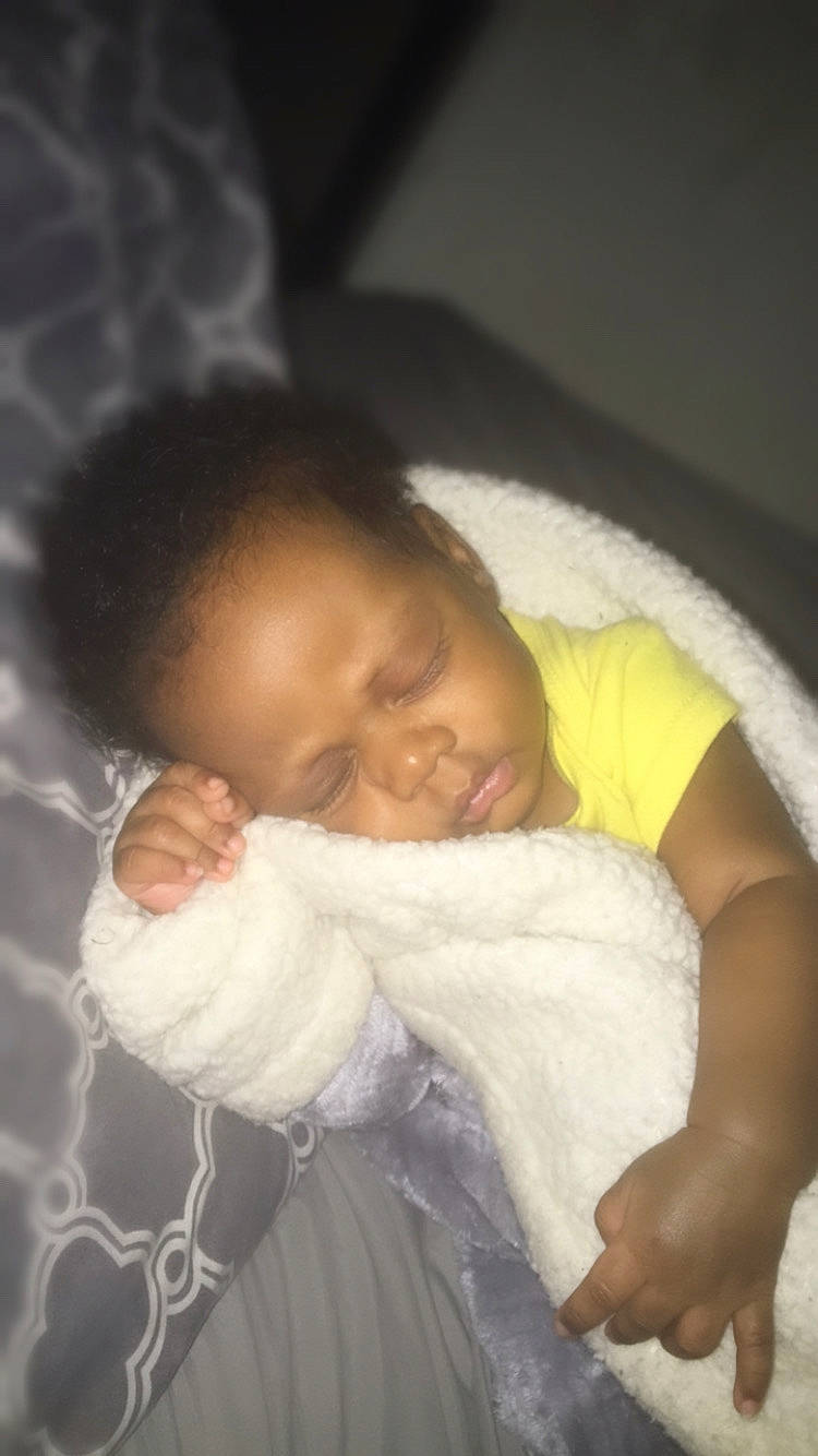 Khamari is registered to the contest to win money with this photo: arm, baby, bedtime, cheek, child, eye, nap, nose, person, skin, sleep, toddler