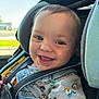 Levi Wade joined the competition — help win amazing prizes! baby, babylaughing, car, car_interior, carseat, clothing, coat, cushion, face, happy, head, homedecor, jacket, machine, pants, person, photography, portrait, smile, wheel