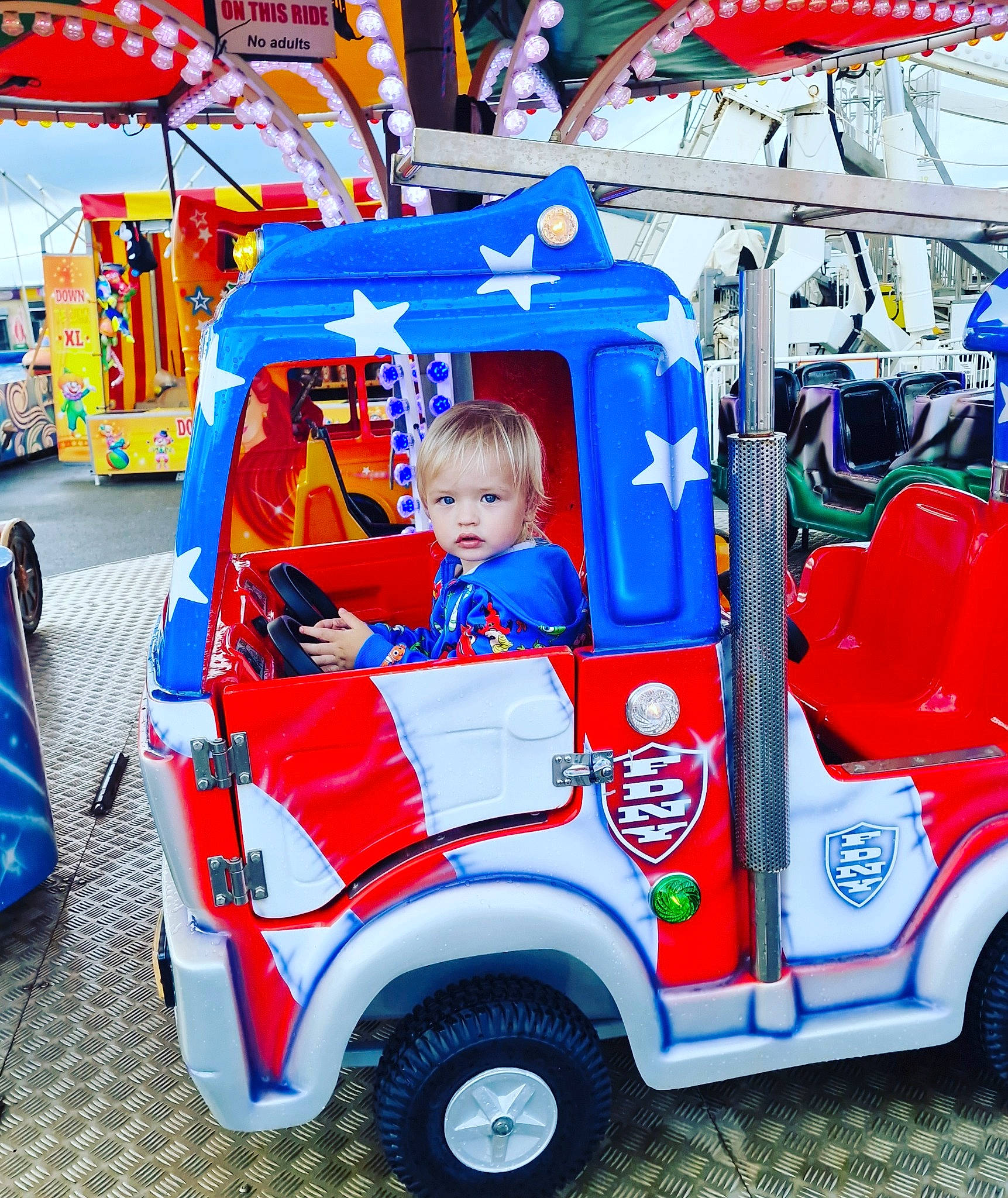 Jaxson joined the competition — help win amazing prizes! auto_part, automotive_design, automotive_exterior, automotive_wheel_system, blue, classic, electric_blue, event, fun, leisure, motor_vehicle, person, photograph, recreation, red, riding_toy, snapshot, tire, toddler, vehicle