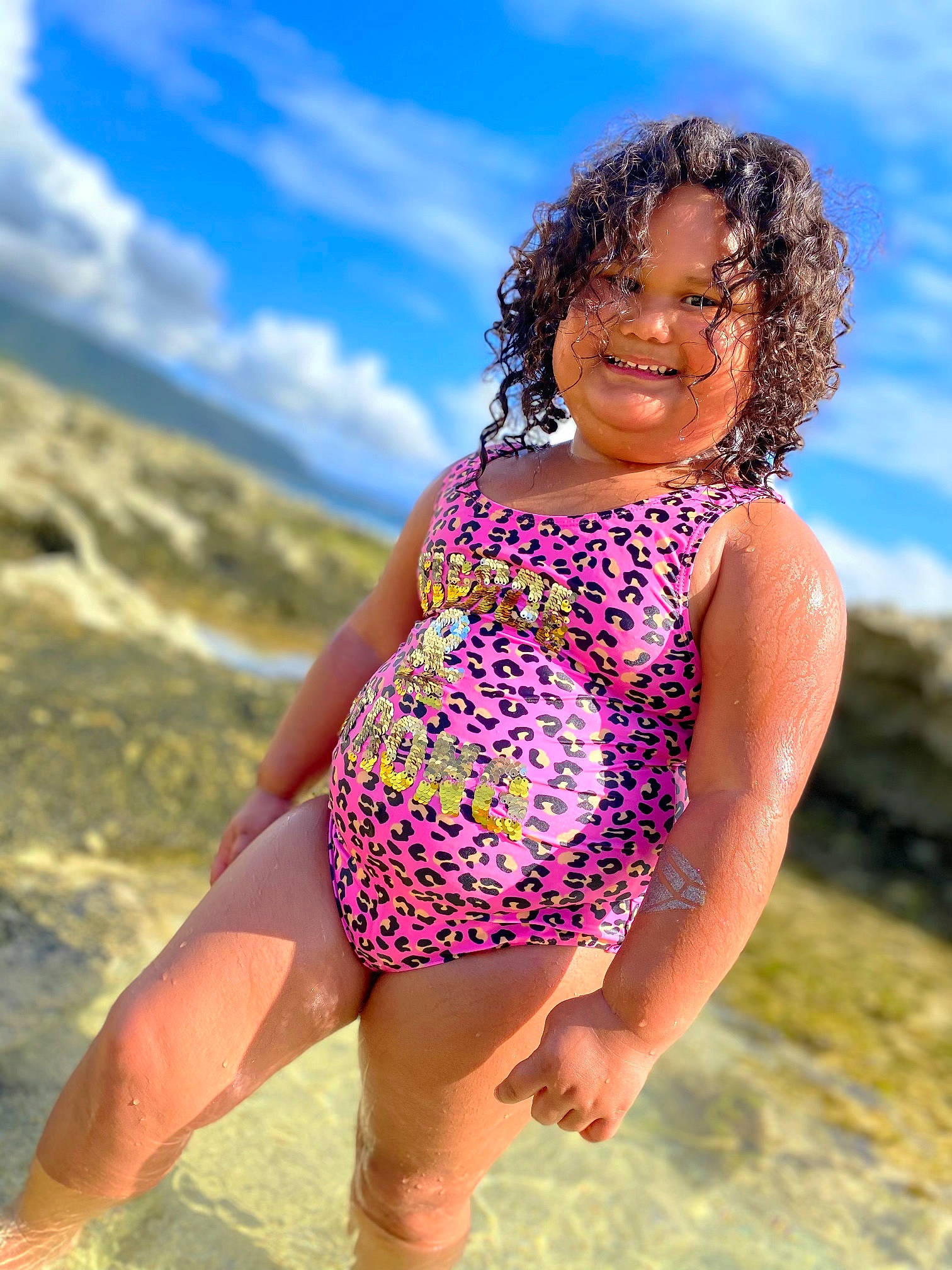 Jeihzlee joined the competition — help win amazing prizes! barefoot, cloud, face, flash_photography, fun, grass, happy, joy, leg, leisure, long_hair, magenta, one_piece_swimsuit, people_in_nature, person, sand, skin, sky, smile, swimwear