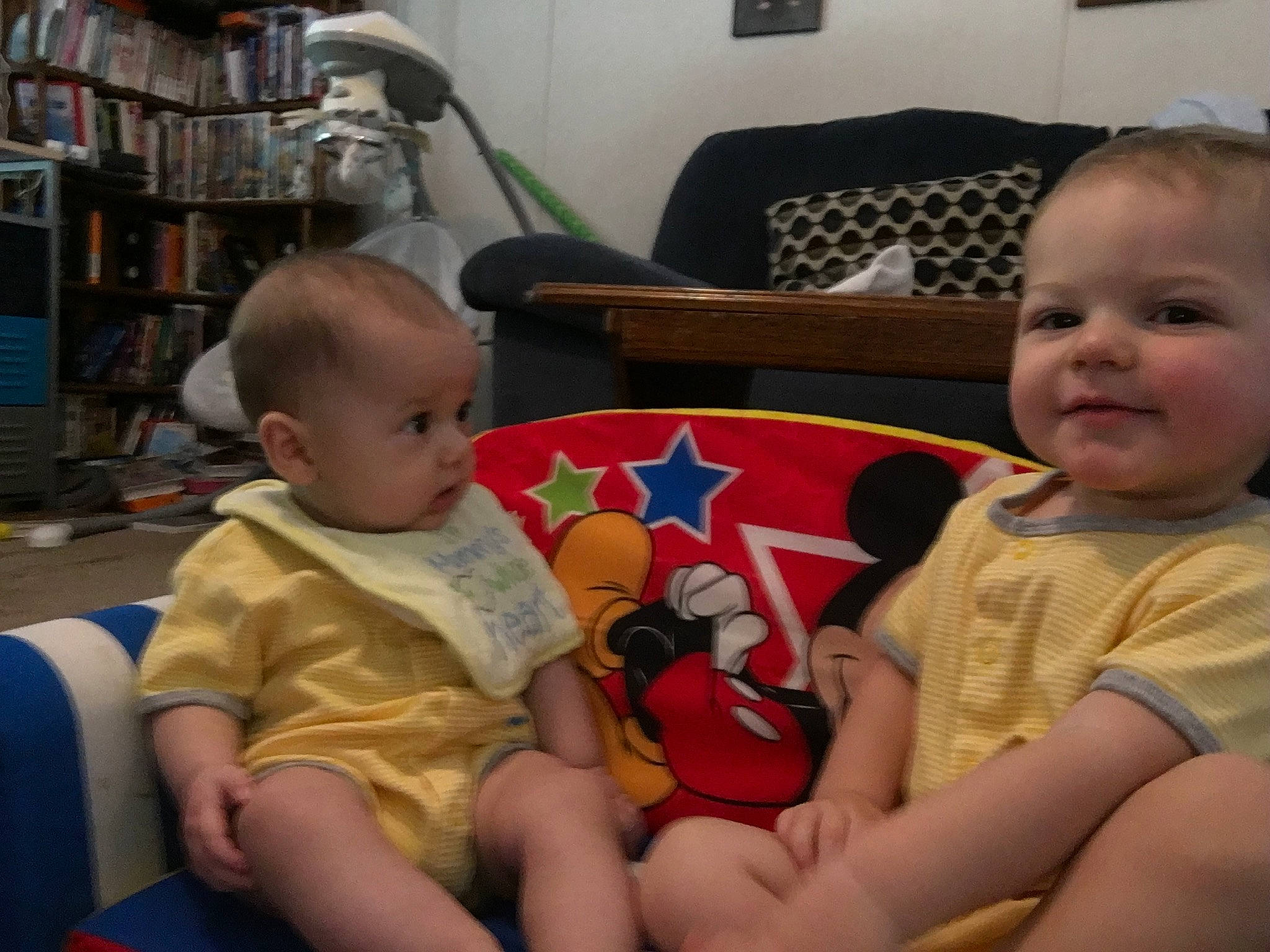 Parker is registered to the contest to win money with this photo: baby, cheek, child, cousin, ear, eye, face, finger, fun, head, iris, lap, leg, mouth, people, person, play, room, sitting, skin