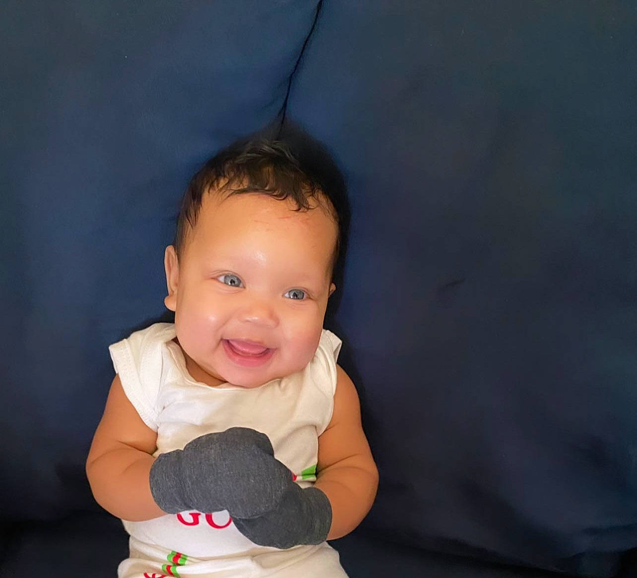 Leilani joined the competition — help win amazing prizes! arm, baby, baby_toddler_clothing, cheek, child, chin, finger, flash_photography, gesture, happy, human_body, iris, lip, neck, nose, person, skin, sleeve, smile, thumb