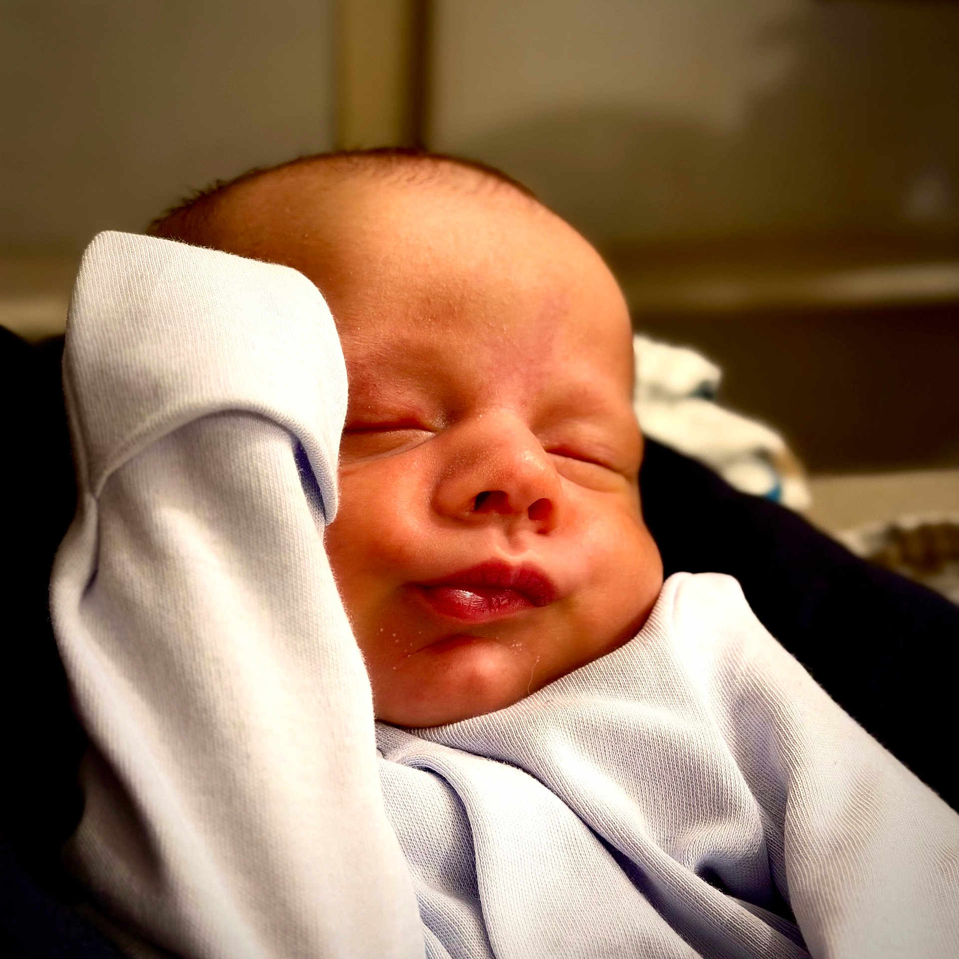 John is registered to the contest to win money with this photo: baby, sleeping, infant, face, skin, hand, clothing, white, peaceful, cute, portrait, newborn, soft, resting, closeup, young, relaxed, indoors, child, person