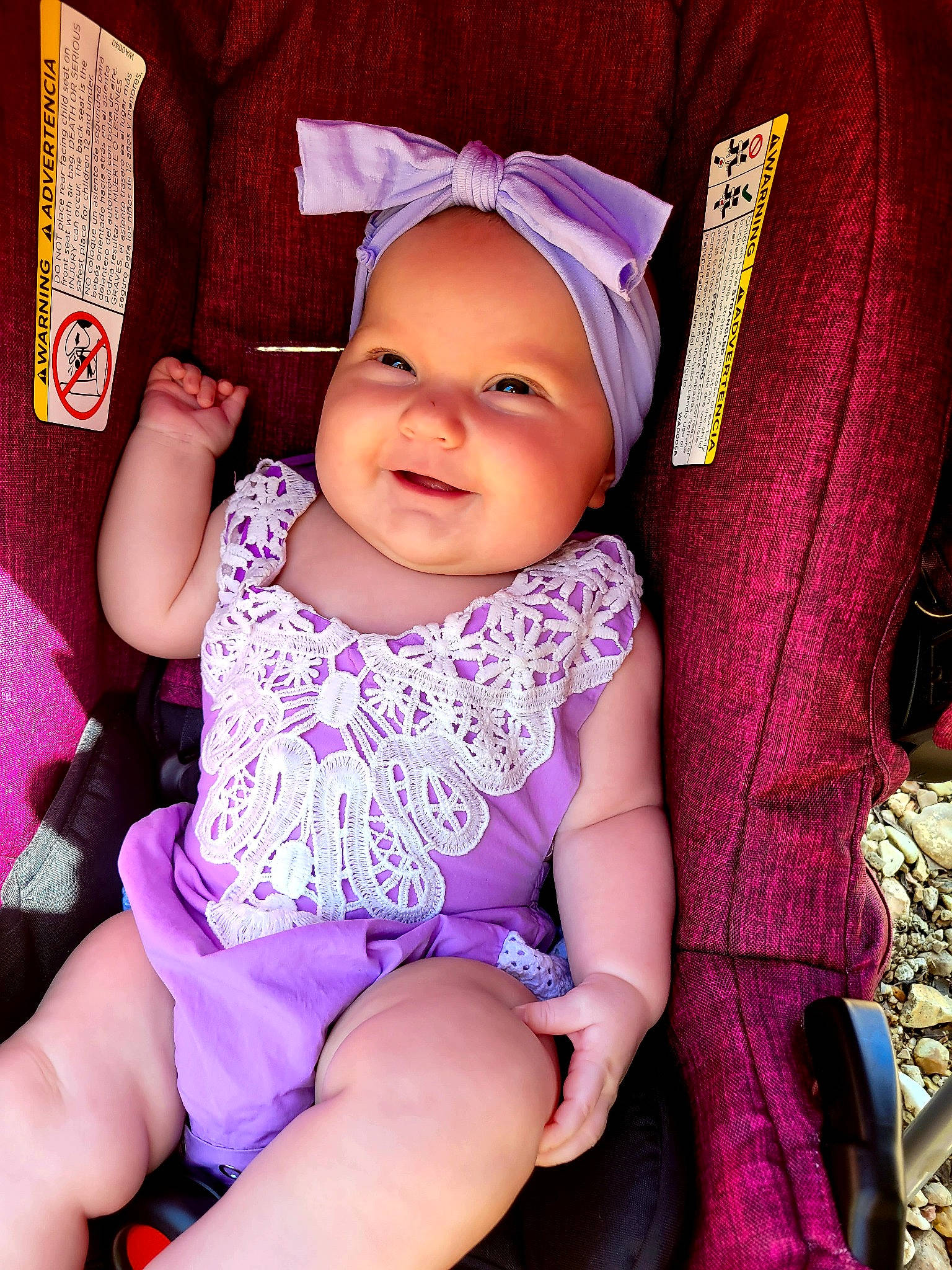 Freya is registered to the contest to win money with this photo: baby, baby_toddler_clothing, cheek, cool, eye, face, fashion, happy, headwear, human_body, iris, mouth, person, pink, product, purple, skin, sleeve, smile, textile