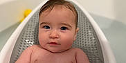 Avery is registered to the contest to win money with this photo: baby, bathtub, child, water, wet_hair, skin, face, blue_eyes, indoor, bath_time, cute, infant, relaxing, portrait, baby_bath, plush, soft_light, baby_skin, childhood, young