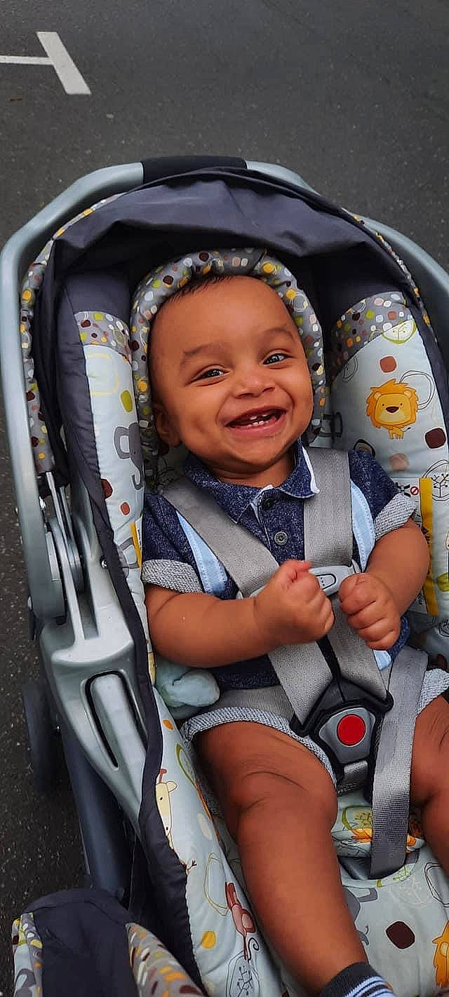 Josiah joined the competition — help win amazing prizes! auto_part, baby, baby_carriage, baby_in_car_seat, baby_products, baby_toddler_clothing, car_seat, child, comfort, eye, fun, happy, joy, mouth, outerwear, person, product, sitting, skin, smile