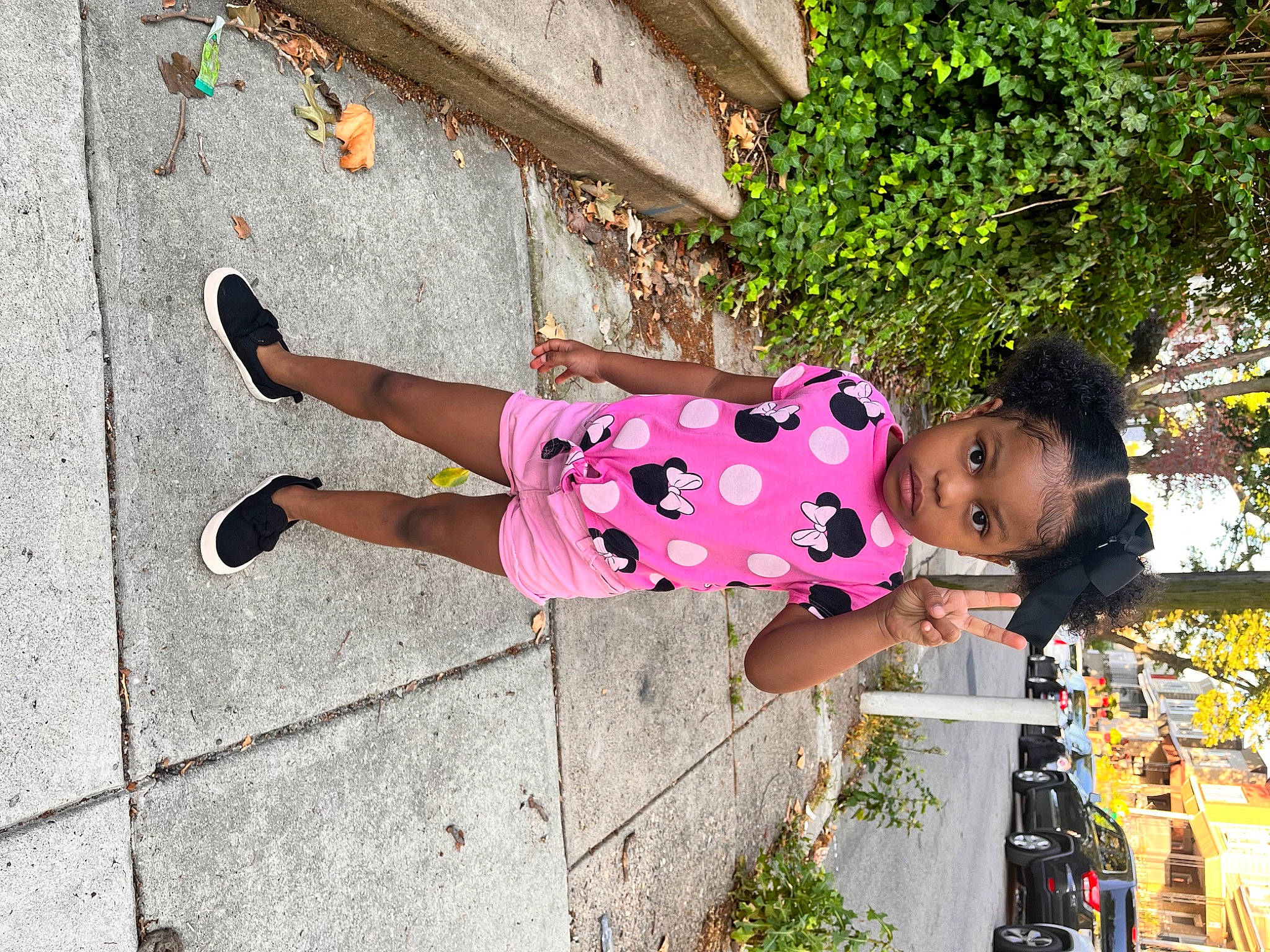 Azyah joined the competition — help win amazing prizes! child, foot, fun, happy, human_leg, human_settlement, leisure, magenta, pattern, pedestrian, person, pink, plant, public_space, recreation, sandal, sidewalk, street, thigh, toddler