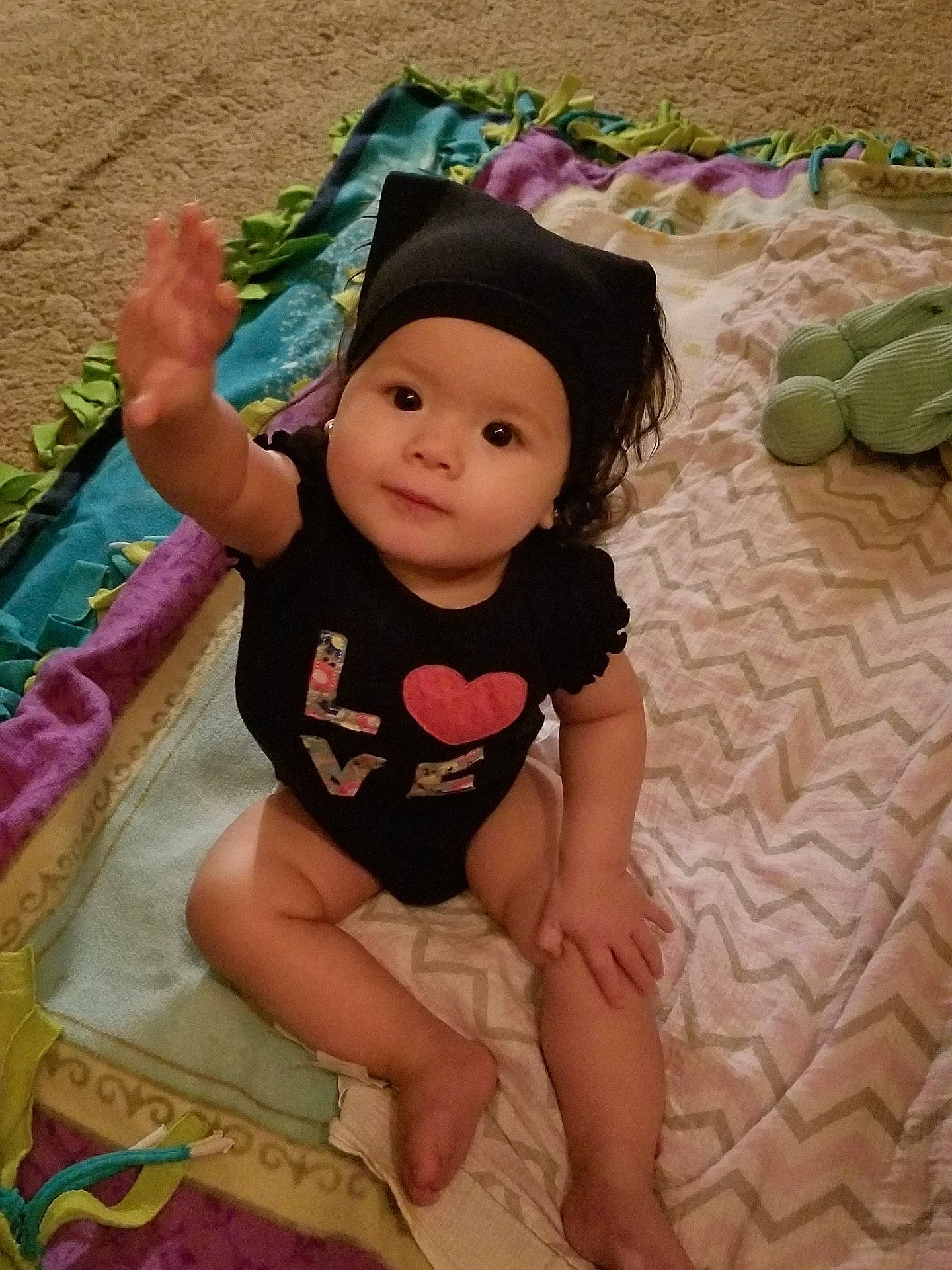 Caizlinn Alderete is registered to the contest to win money with this photo: abdomen, arm, child, finger, girl, headgear, infant, leg, person, product, toddler