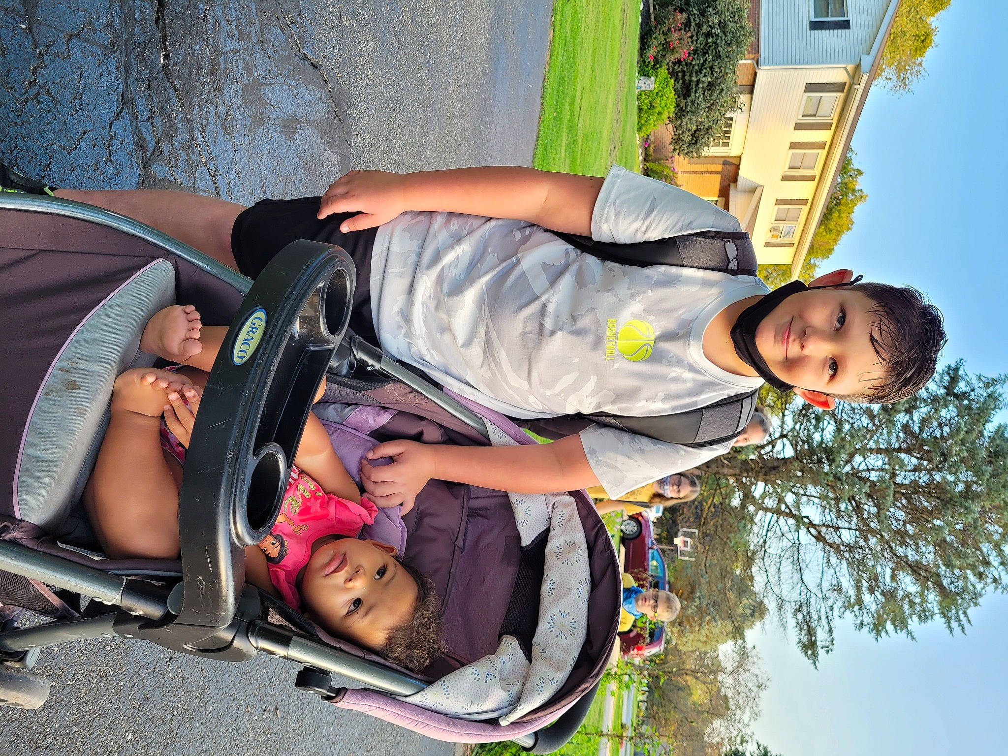 Jacques is registered to the contest to win money with this photo: arm, baby_products, child, family_car, fun, grass, green, happy, joy, lap, leisure, motor_vehicle, person, plant, recreation, sitting, sky, smile, toddler, travel