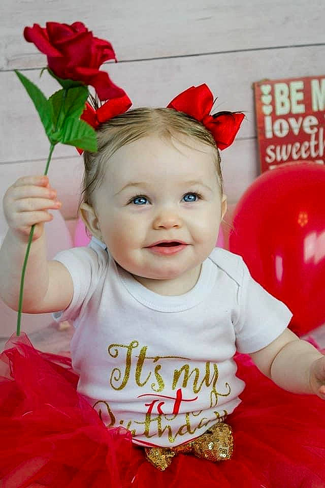 Penelope joined the competition — help win amazing prizes! baby, baby_toddler_clothing, child, dress, face, facial_expression, flower, hairstyle, happy, head, headgear, joy, magenta, person, pink, plant, red, skin, sleeve, smile